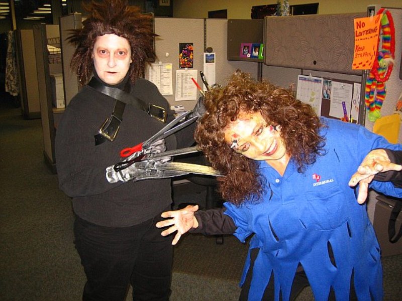 Staff members dressed up in costumes for halloween
