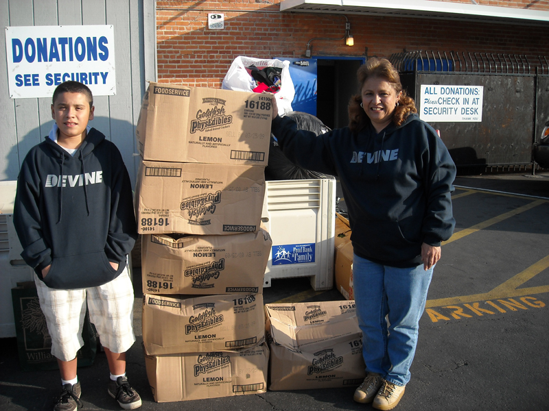 Volunteers participate in a food bank donation