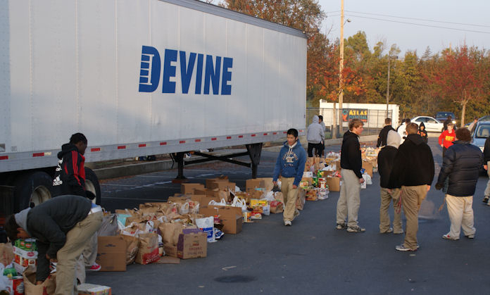 Volunteers help at Jesuit food drive