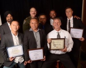 Front row l-r: Junnyl Rasay, Bernie Siano, Robert St John.<br /> Back row l-r: Harpal Sandhu, CHP Chief Jim Epperson, Kapil Kumar, Amandip Rana, Vitaly Bondaruk