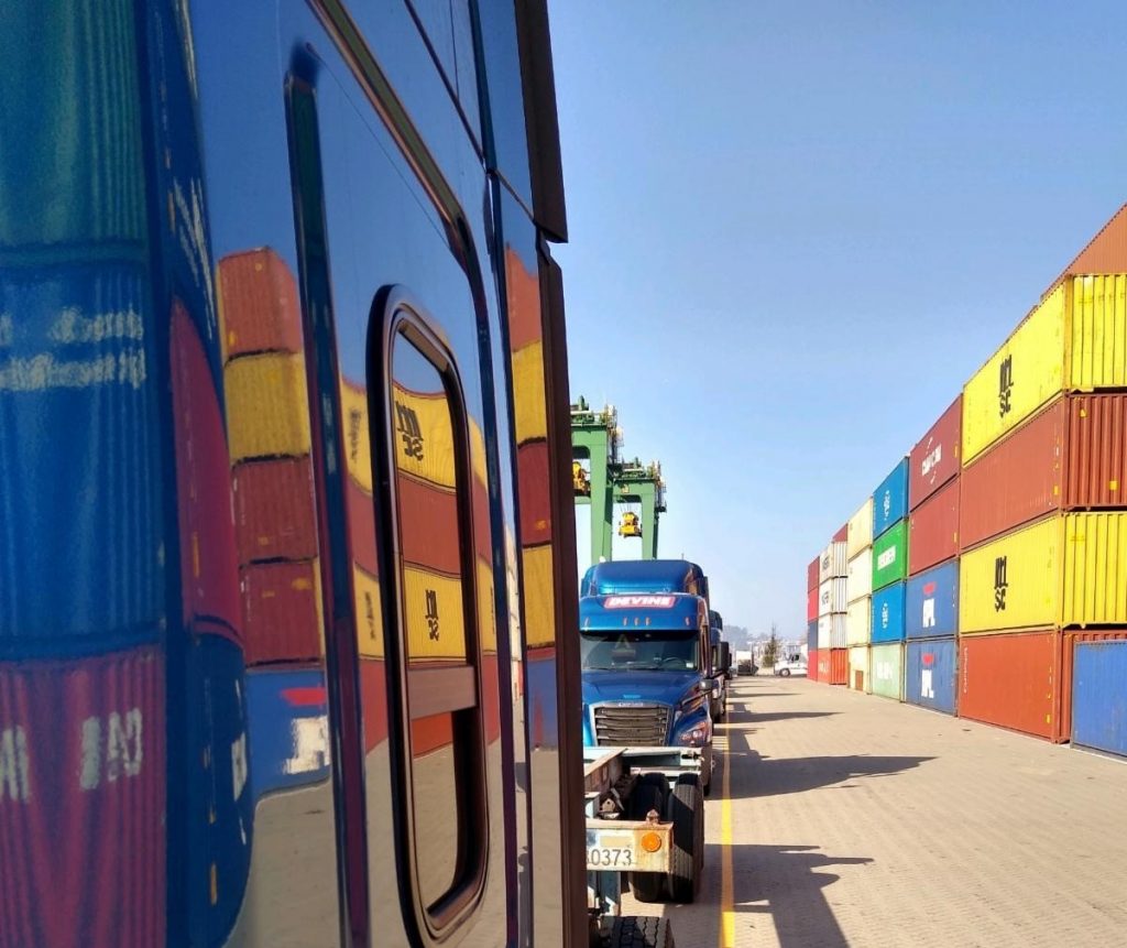 truck next to variety color containers