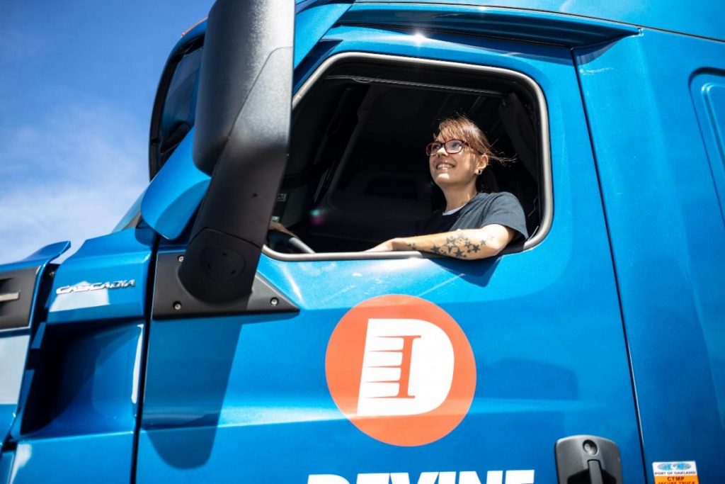 Women driver sitting inside her Truck