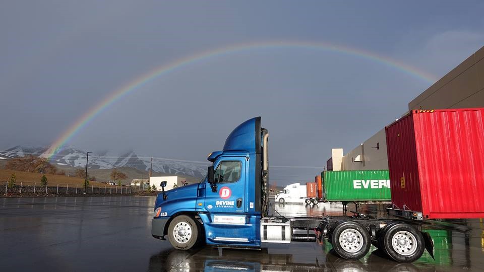 Rainbow behind Devine truck