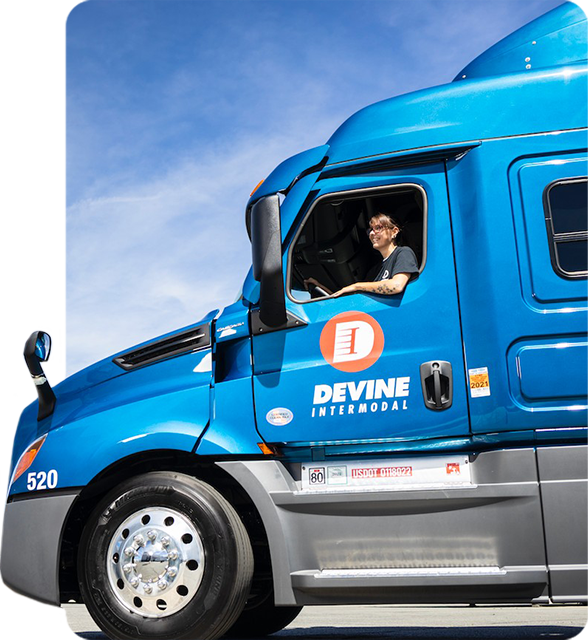 Devine Intermodal Truck Driver looking out from the window.