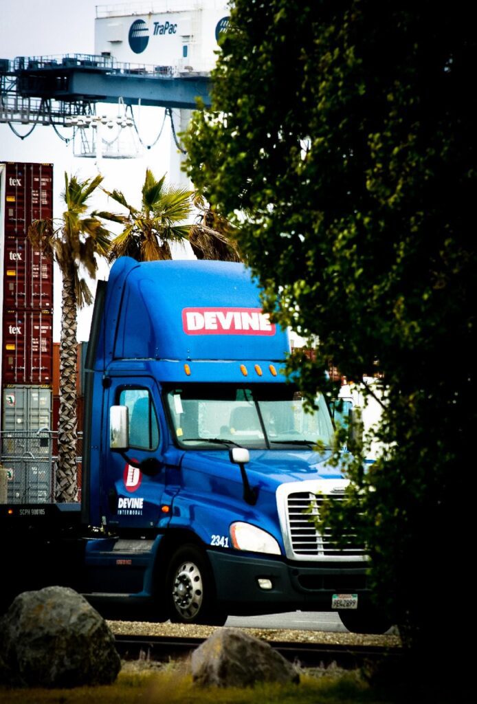 Devine Blue truck in front of the port.